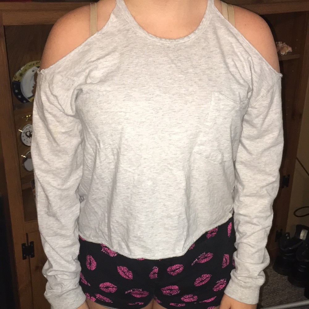 Victoria’s Secret pink cold shoulder top.